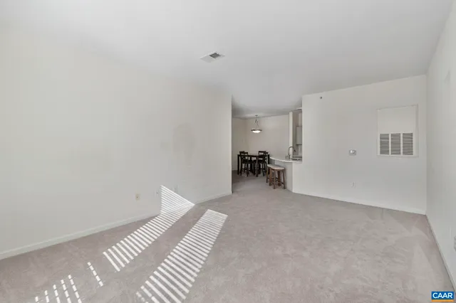 a view of kitchen and workspace