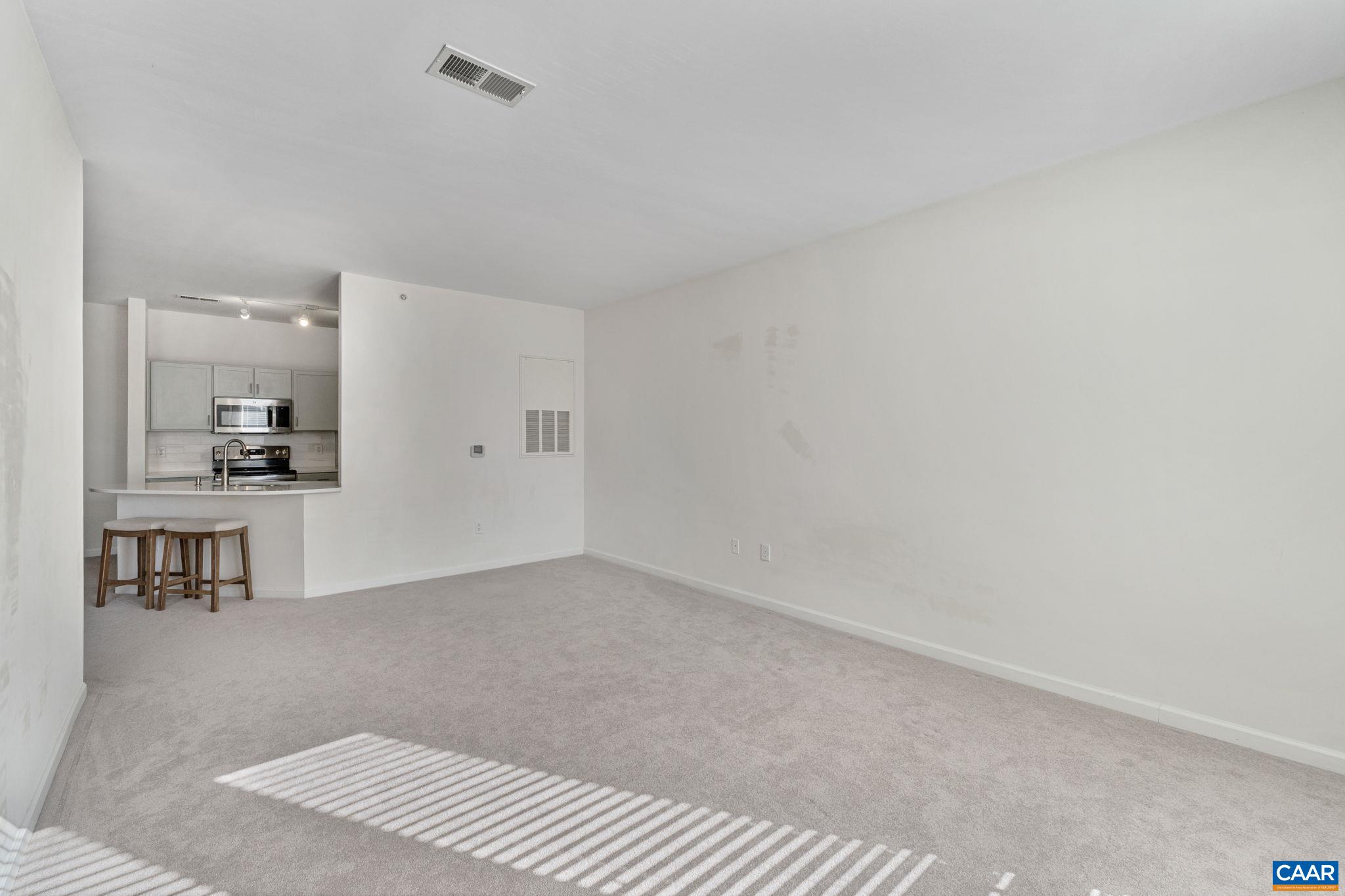 750 Walker Square, Unit 3B Charlottesville, VA 22903 - Photo 15 of 36 a view of kitchen and workspace