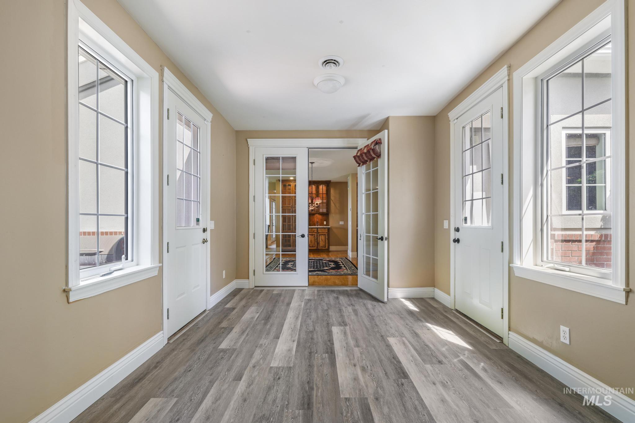 1526 Highway 26 Gooding, ID 83330 - Photo 32 of 48 Foyer entrance with french doors and light wood-type flooring