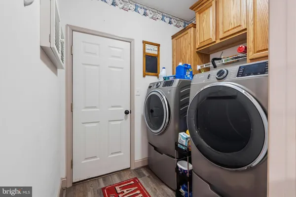 a utility room with dryer and washer