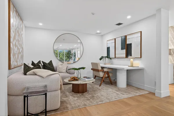 a living room with sink and window