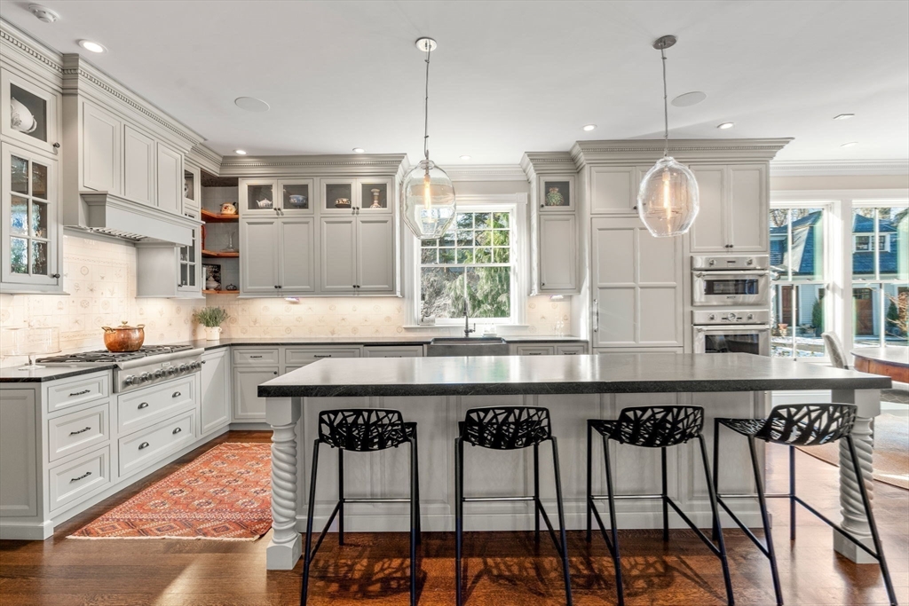 215 Boston Post Road Weston, MA 02493 - Photo 14 of 37 a kitchen with a counter space cabinets and wooden floor