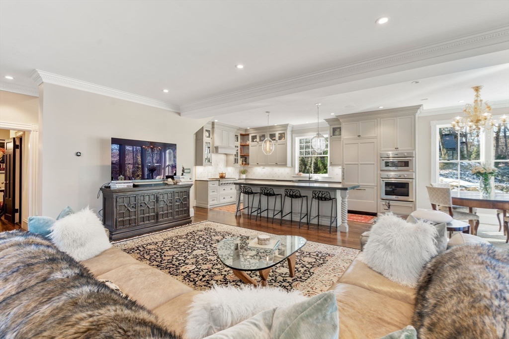 215 Boston Post Road Weston, MA 02493 - Photo 19 of 37 a living room with furniture and a wooden floor