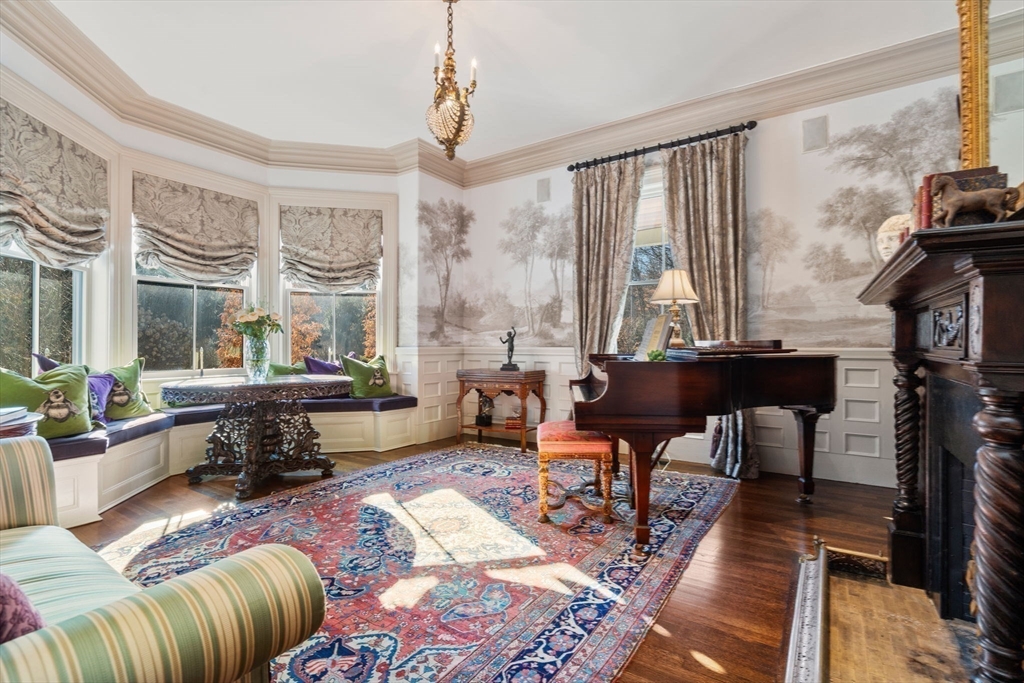 215 Boston Post Road Weston, MA 02493 - Photo 20 of 37 a living room with furniture and a large window