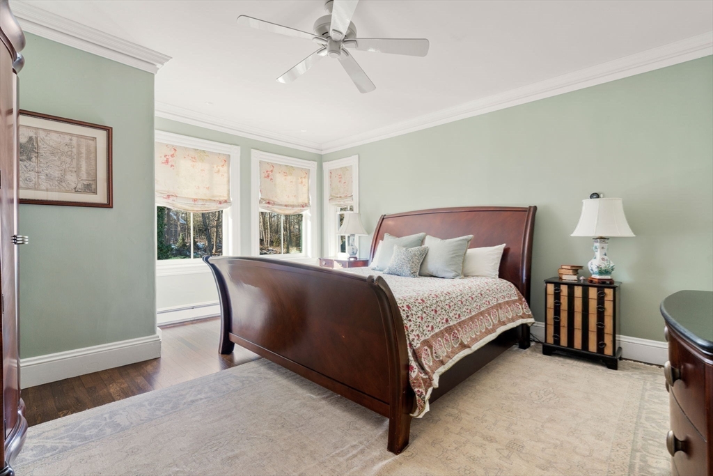 215 Boston Post Road Weston, MA 02493 - Photo 26 of 37 a bedroom with a bed chair and a window