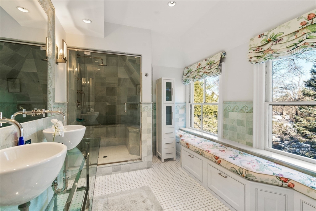 215 Boston Post Road Weston, MA 02493 - Photo 33 of 37 a bathroom with a granite countertop tub shower and mirror