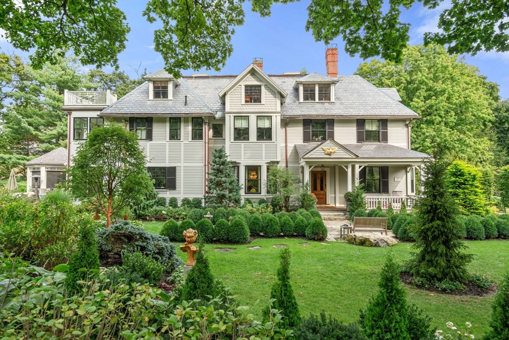 215 Boston Post Road Weston, MA 02493 - Photo 4 of 37 a front view of a house with a yard