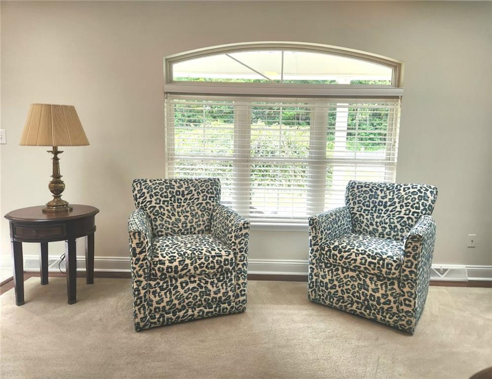 131 Hunter Ridge Road Butler, PA 16001 - Photo 7 of 45 a bedroom with a bed and a lamp