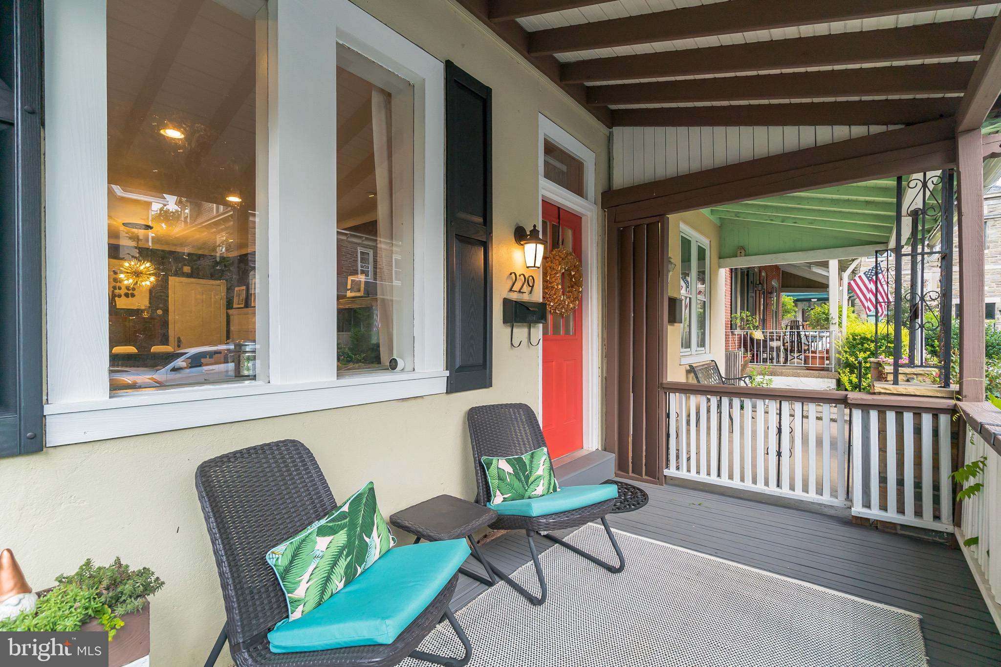 229 Benezet Street Philadelphia, PA 19118 - Photo 3 of 36 a balcony with furniture and a potted plant