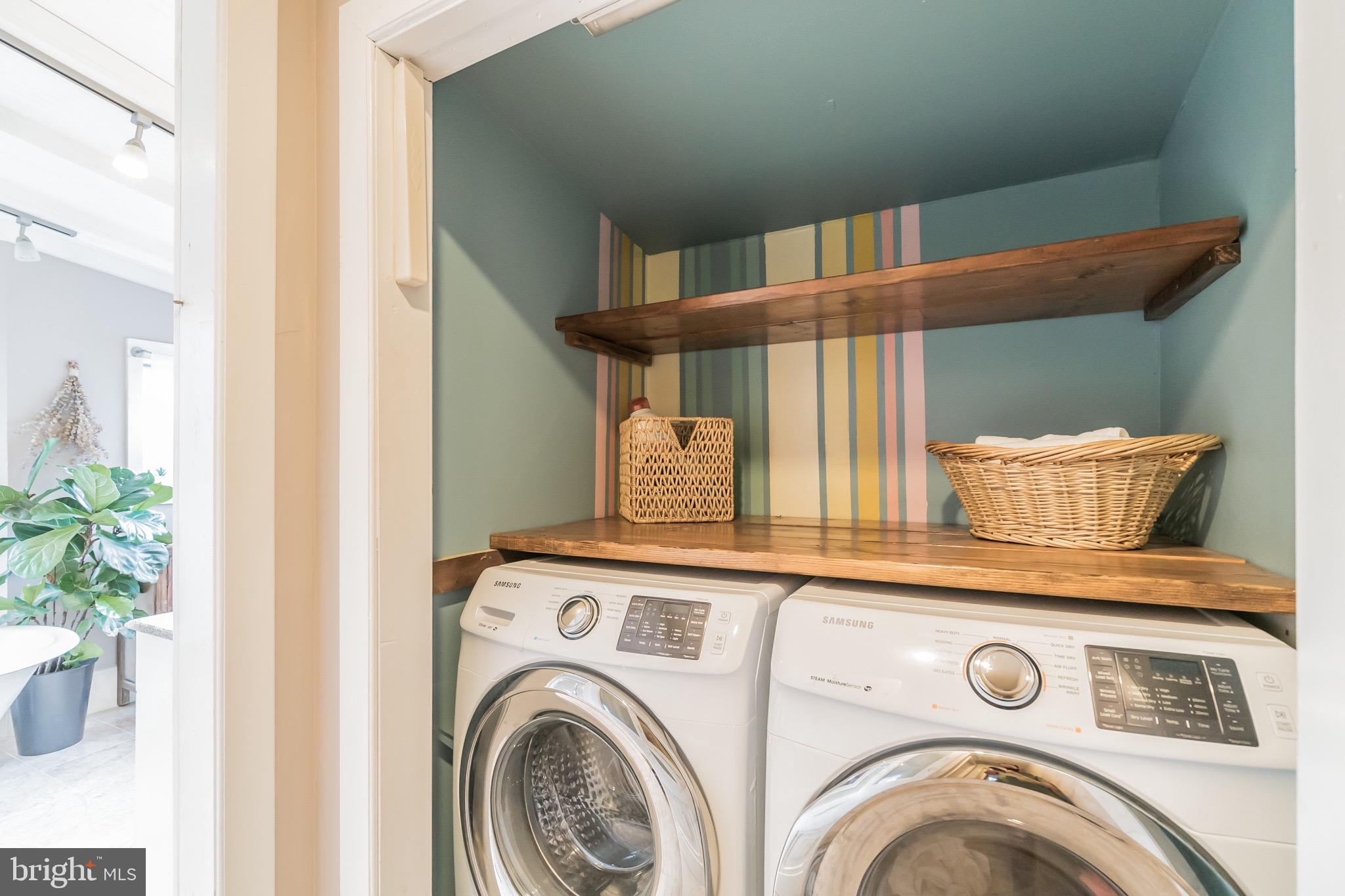 229 Benezet Street Philadelphia, PA 19118 - Photo 29 of 36 a utility room with dryer and washer