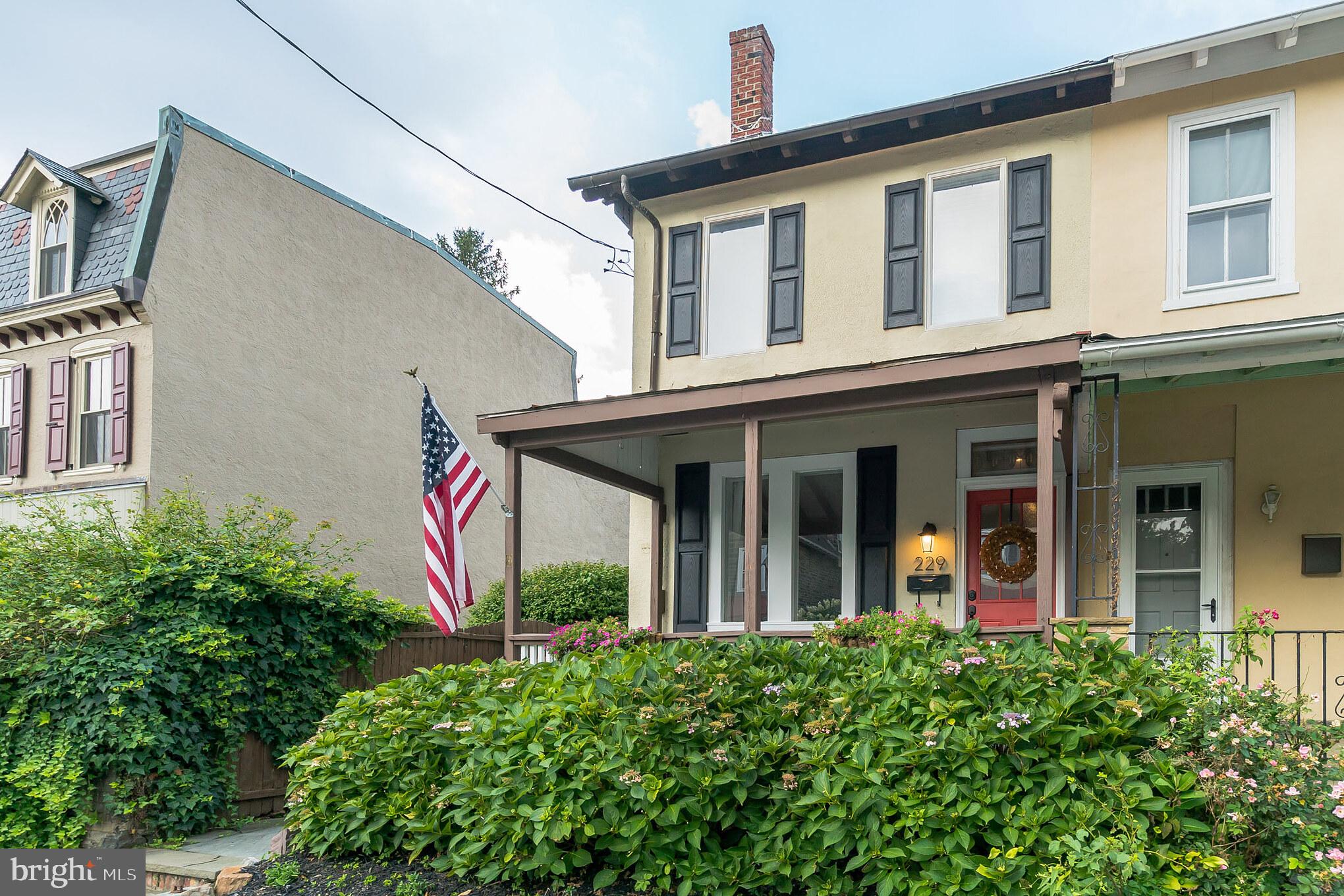 229 Benezet Street Philadelphia, PA 19118 - Photo 36 of 36 front view of a house with a small porch