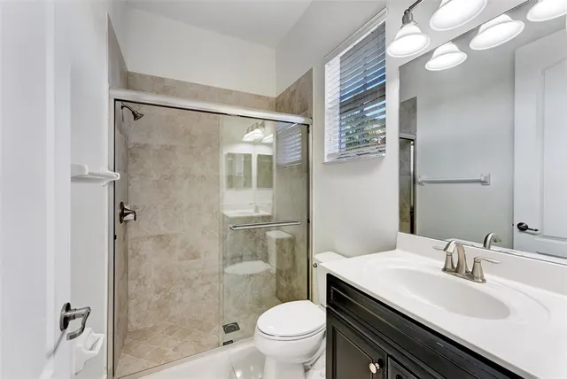 a view of a backyard with swimming pool