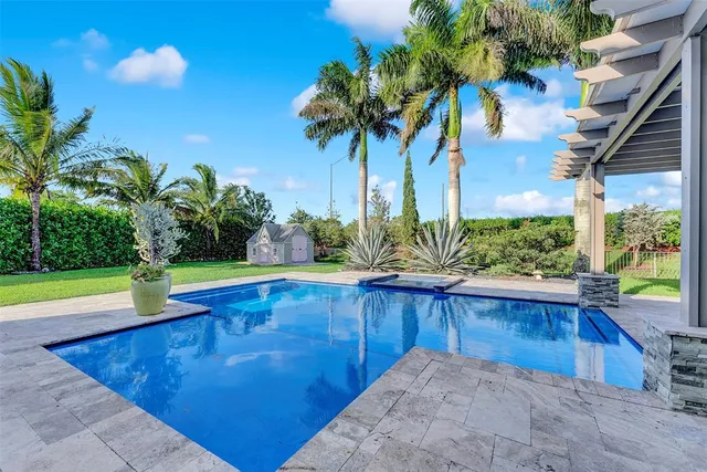 a kitchen with a sink and a window