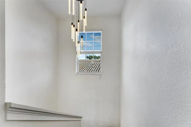 an aerial view of a house with outdoor space