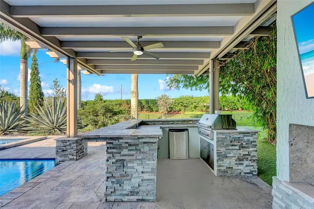 an aerial view of a house with a garden and outdoor space