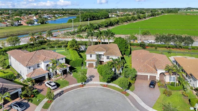 $1,850,000 | 8766 South Miralago Way, Parkland, FL 33076