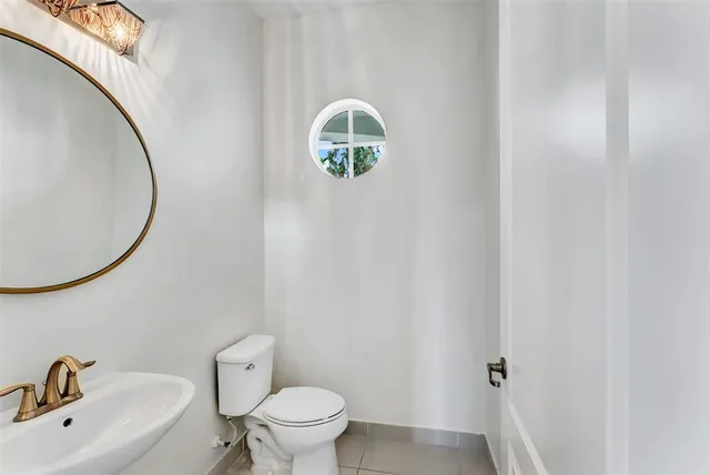 a white tub sitting in a bathroom