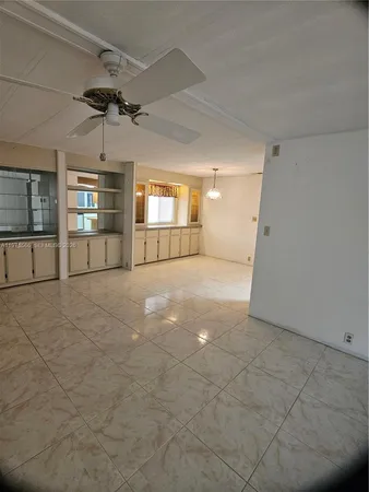 a view of a livingroom with a furniture