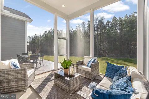 a outdoor living space with furniture and a potted plant