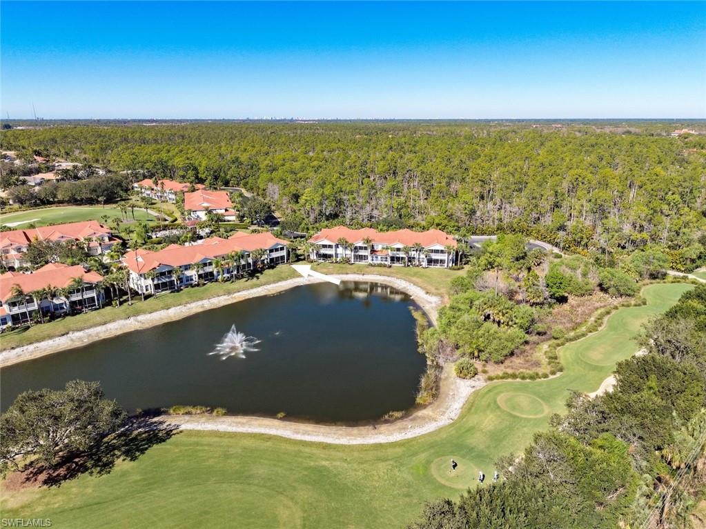 4630 Winged Foot Court, Unit 101 Naples, FL 34112 - Photo 22 of 43 a view of a city