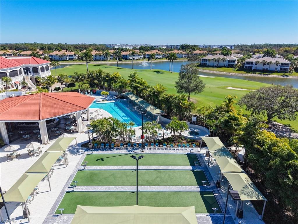 4630 Winged Foot Court, Unit 101 Naples, FL 34112 - Photo 35 of 43 a view of a tennis court