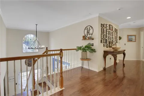 a view of hall way with furniture