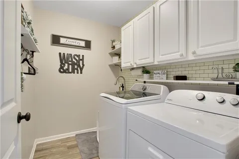 a bedroom with a bed and a mirror