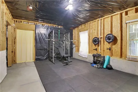 a view of a backyard with a small cabin