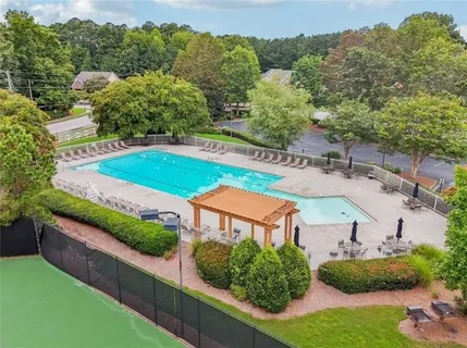 an aerial view of a house with a garden
