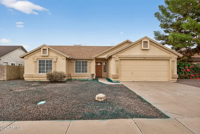 a front view of a house with yard