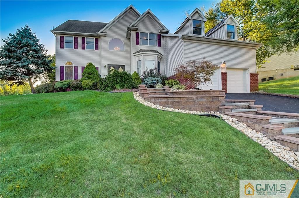 1 Catelli Road Princeton, NJ 08540 - Photo 1 of 1 a front view of a house with garden