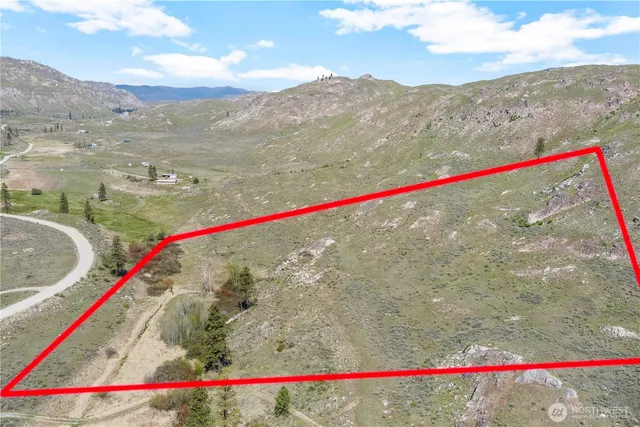 a view of mountain view with mountains in the background