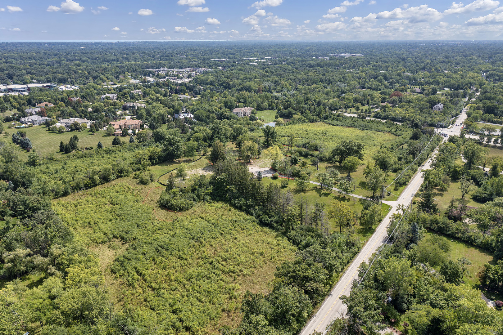 2805 Telegraph Road Bannockburn, IL 60015 - Photo 1 of 1 an aerial view of residential houses with outdoor space and trees