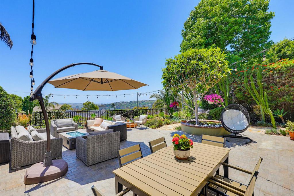 2756 Southampton Road Carlsbad, CA 92010 - Photo 13 of 40 a outdoor living space with furniture and garden view