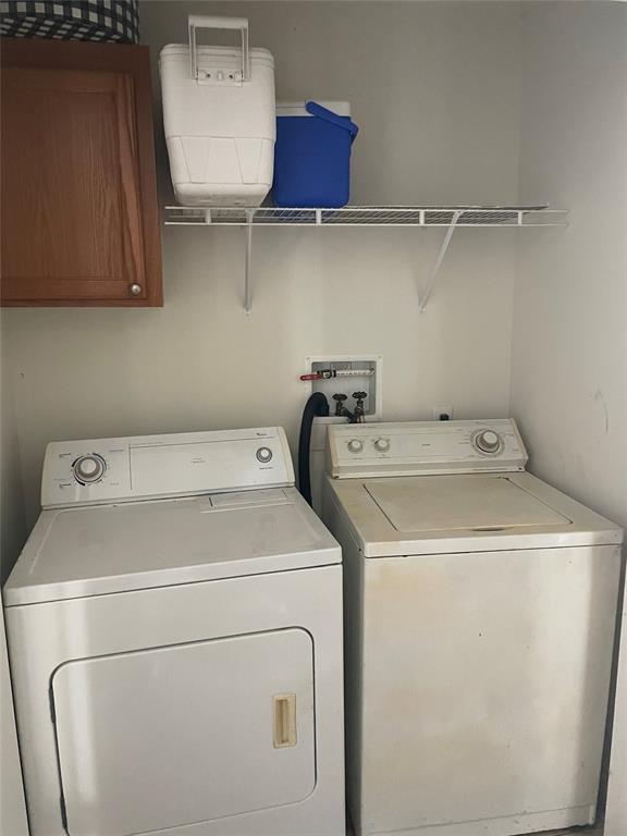 8581 Southwest 16th Street Davie, FL 33324 - Photo 11 of 12 a utility room with dryer and washer