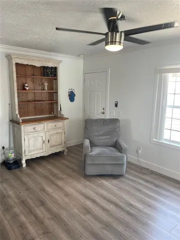 a living room with furniture and window