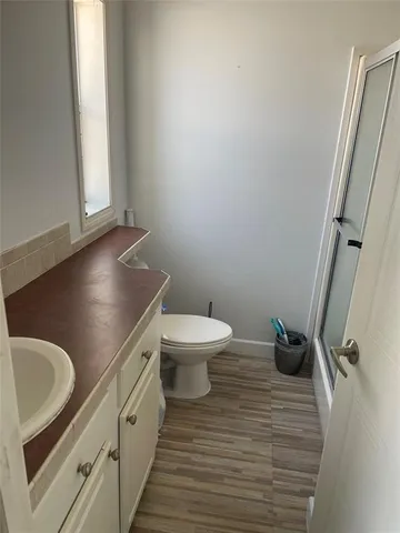a bathroom with a sink and a toilet
