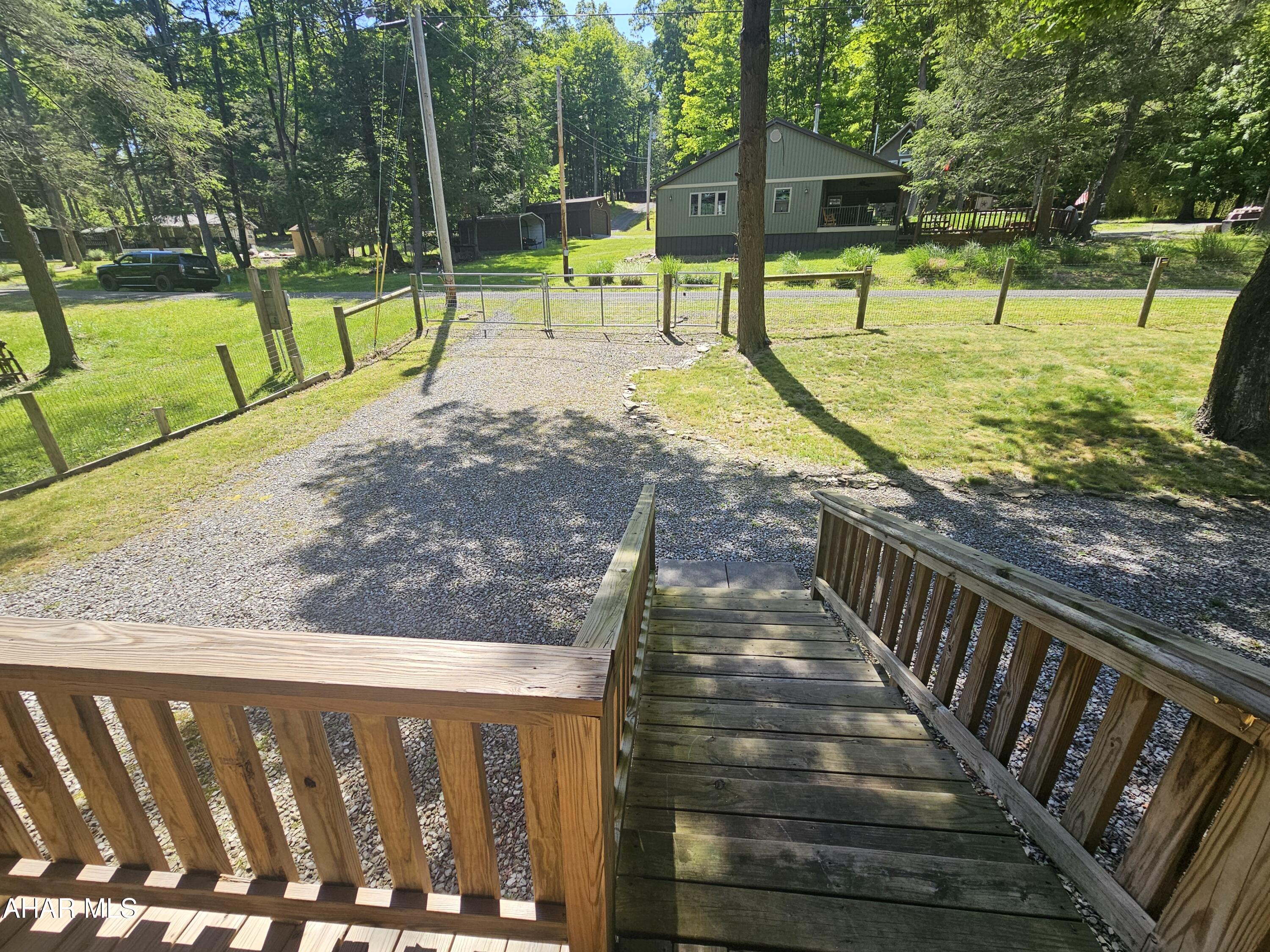 137 Mimosa Circle Flinton, PA 16640 - Photo 7 of 18 a view of a park with swings