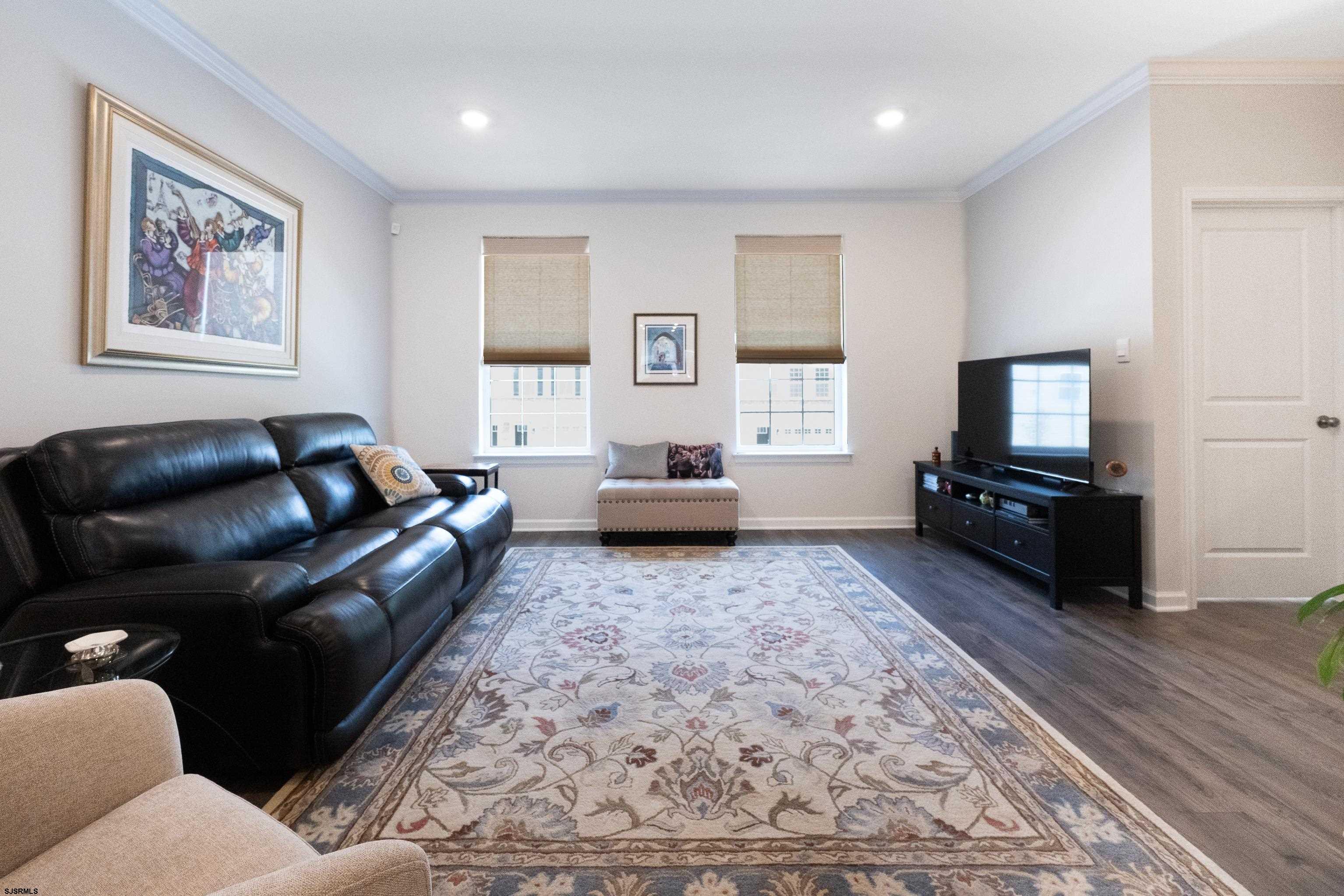 18 Lilac Circle Mount Laurel, NJ 08054 - Photo 14 of 52 a living room with furniture and a flat screen tv
