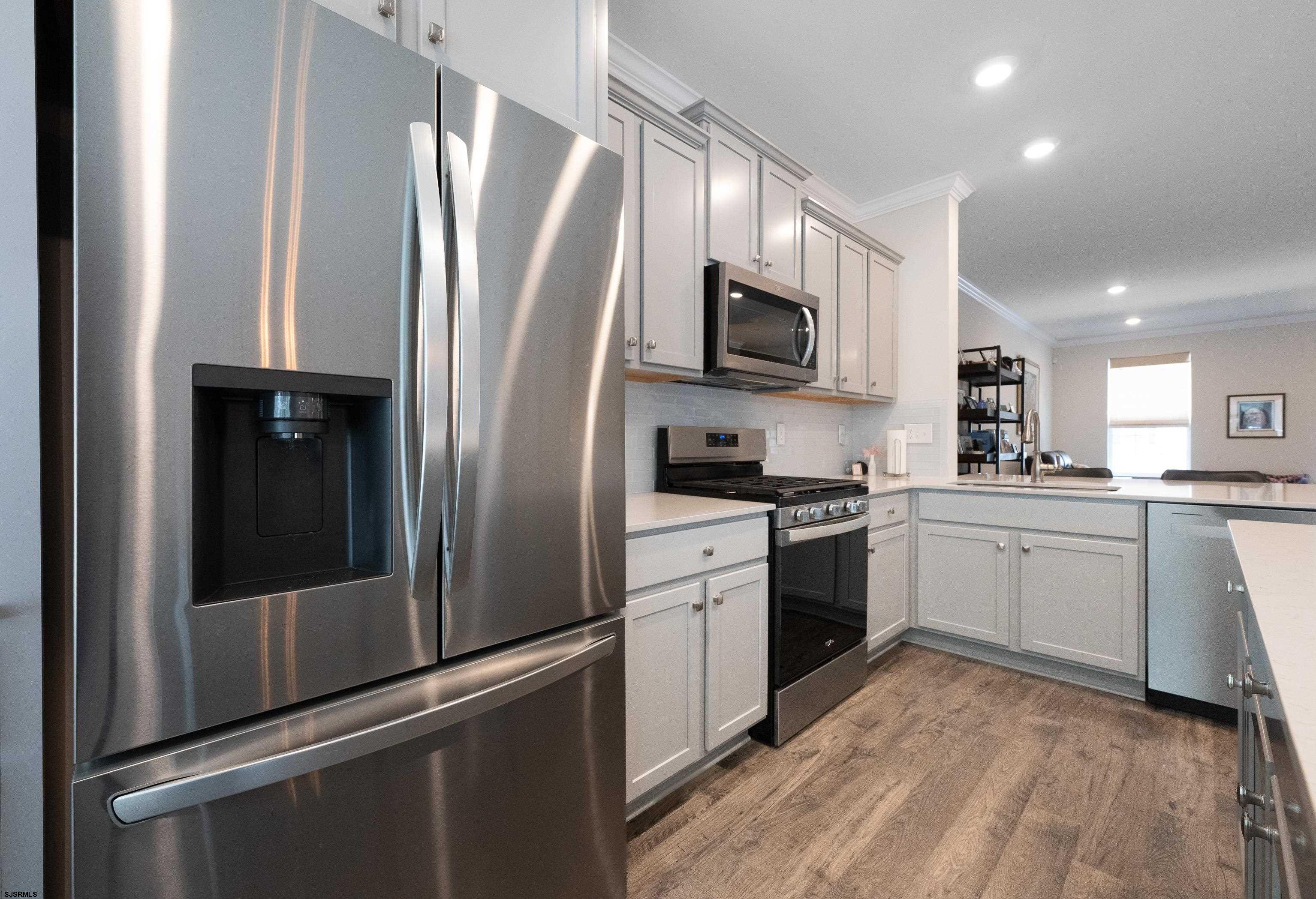 18 Lilac Circle Mount Laurel, NJ 08054 - Photo 18 of 52 a kitchen with stainless steel appliances a refrigerator sink and microwave