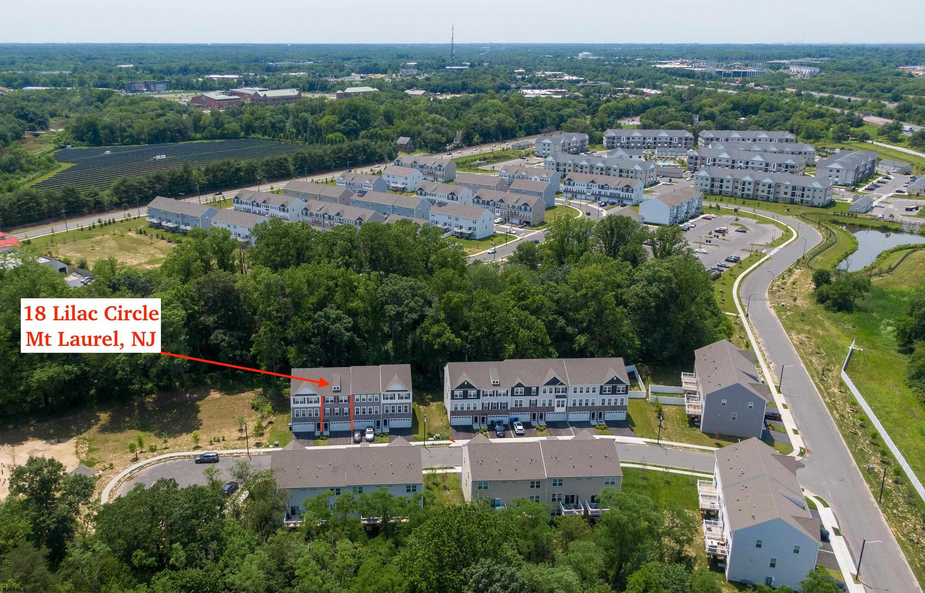 18 Lilac Circle Mount Laurel, NJ 08054 - Photo 2 of 52 an aerial view of a swimming pool and mountain view