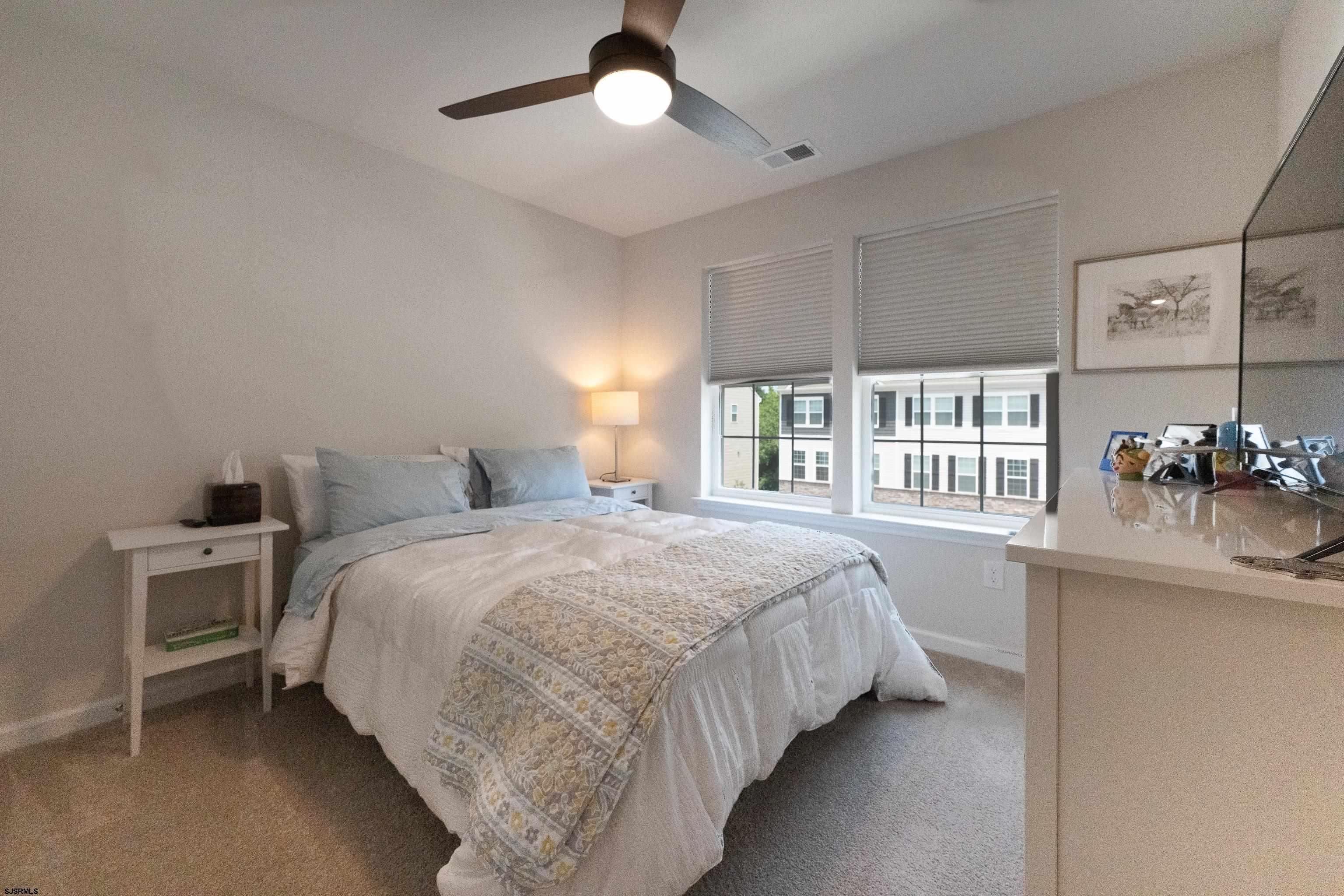 18 Lilac Circle Mount Laurel, NJ 08054 - Photo 35 of 52 a bedroom with a bed and a large window