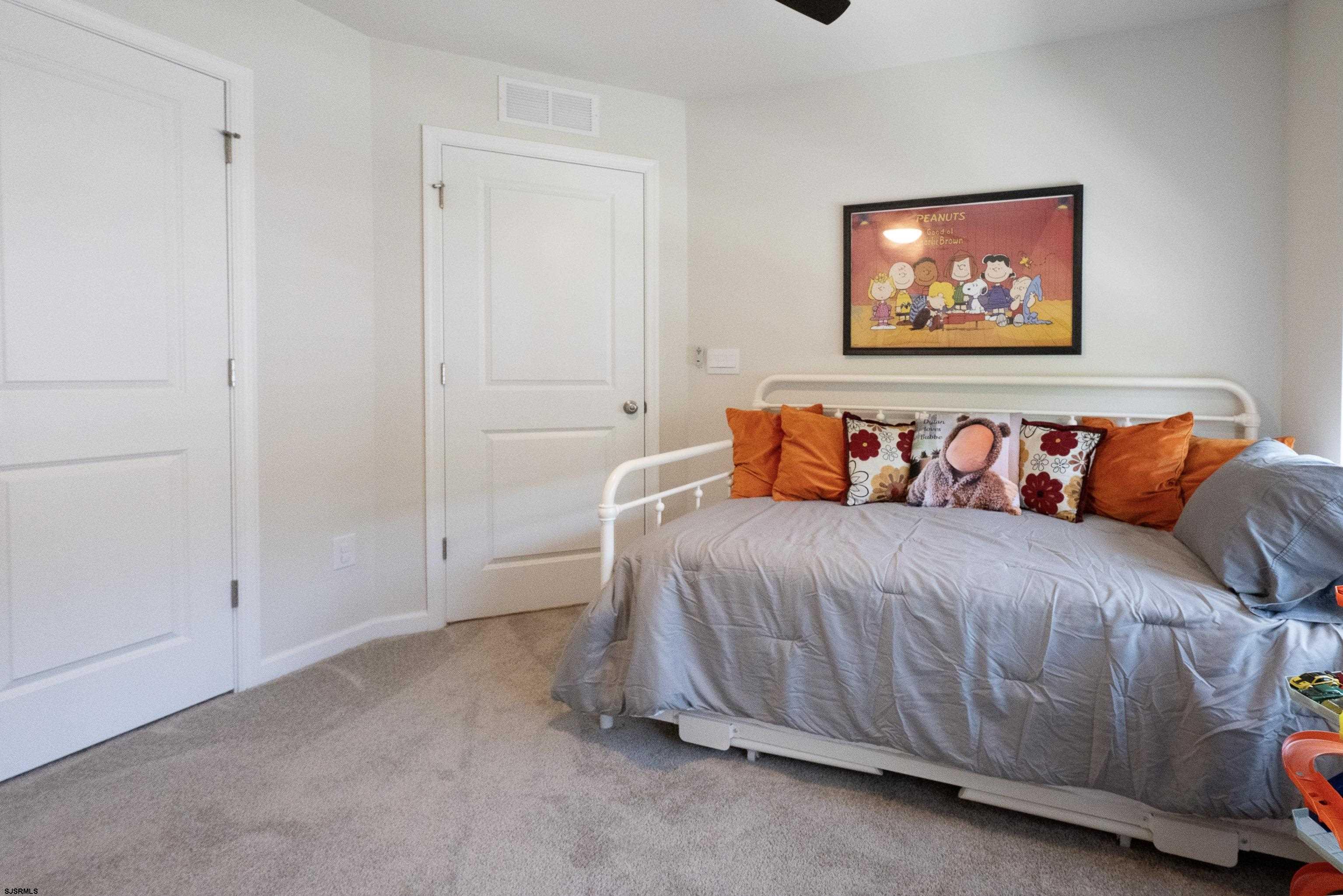 18 Lilac Circle Mount Laurel, NJ 08054 - Photo 37 of 52 a bedroom with a bed and a painting on the wall