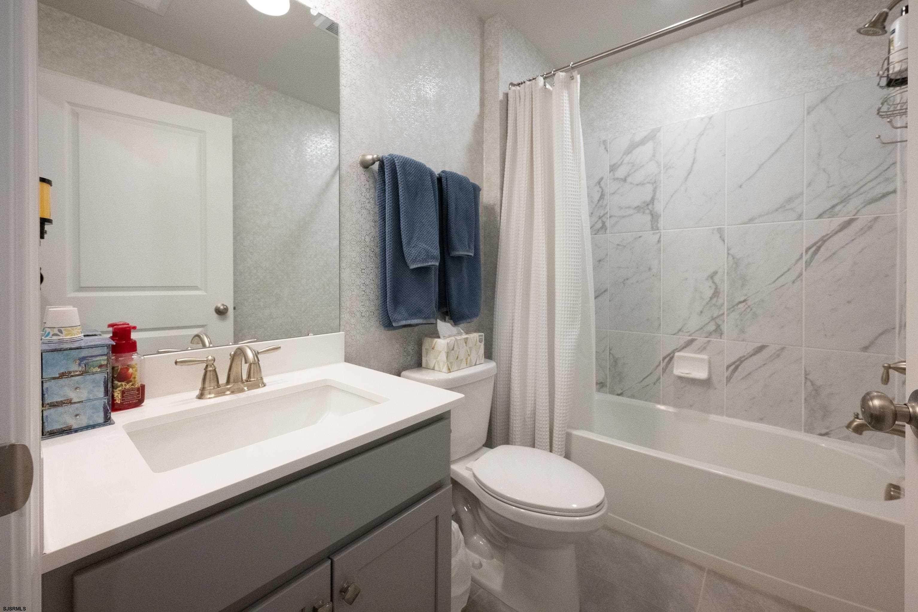 18 Lilac Circle Mount Laurel, NJ 08054 - Photo 39 of 52 a bathroom with a sink a toilet and shower