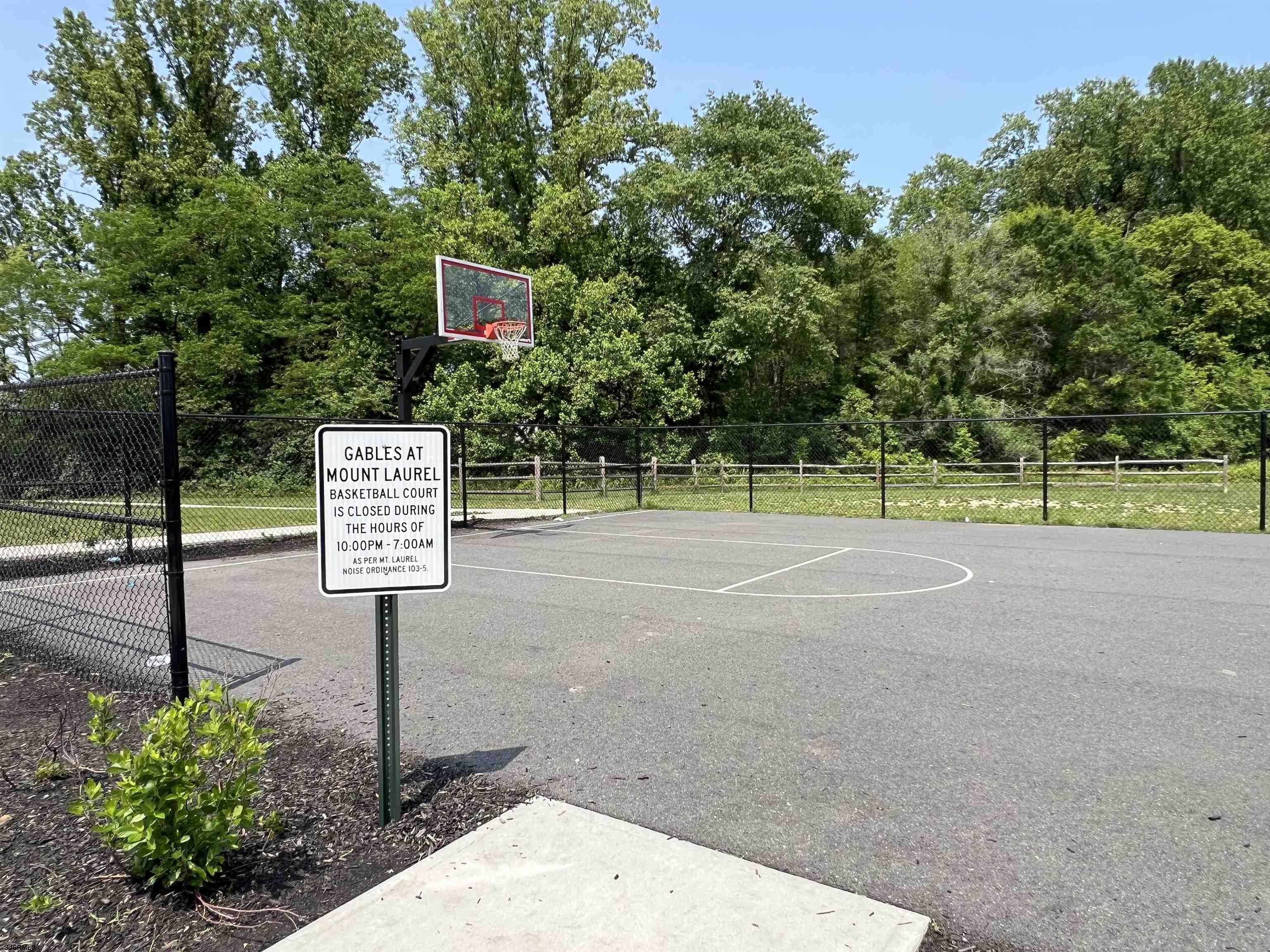 18 Lilac Circle Mount Laurel, NJ 08054 - Photo 50 of 52 a sign board with a park bench