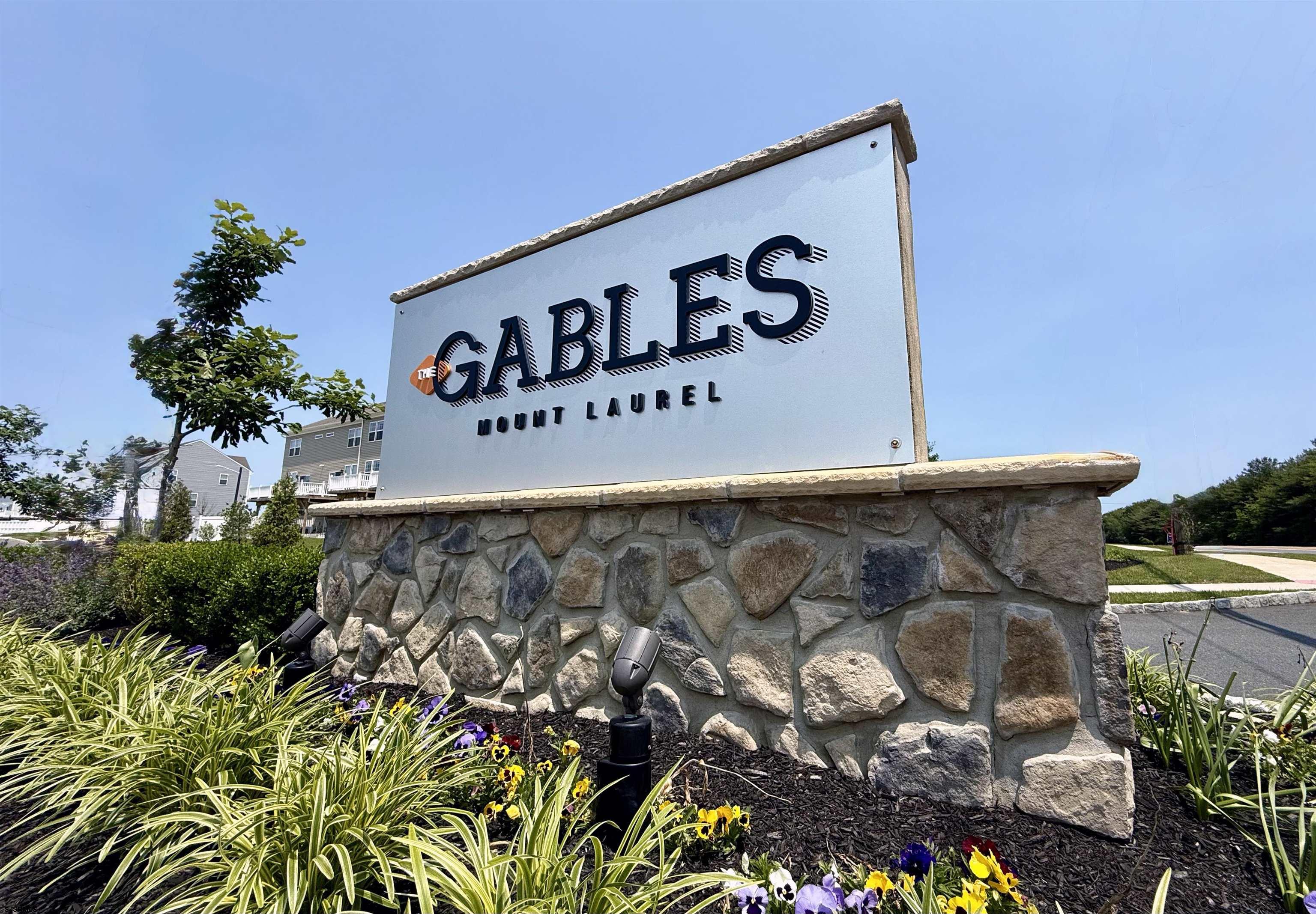 18 Lilac Circle Mount Laurel, NJ 08054 - Photo 52 of 52 a street sign on a wall next to a road