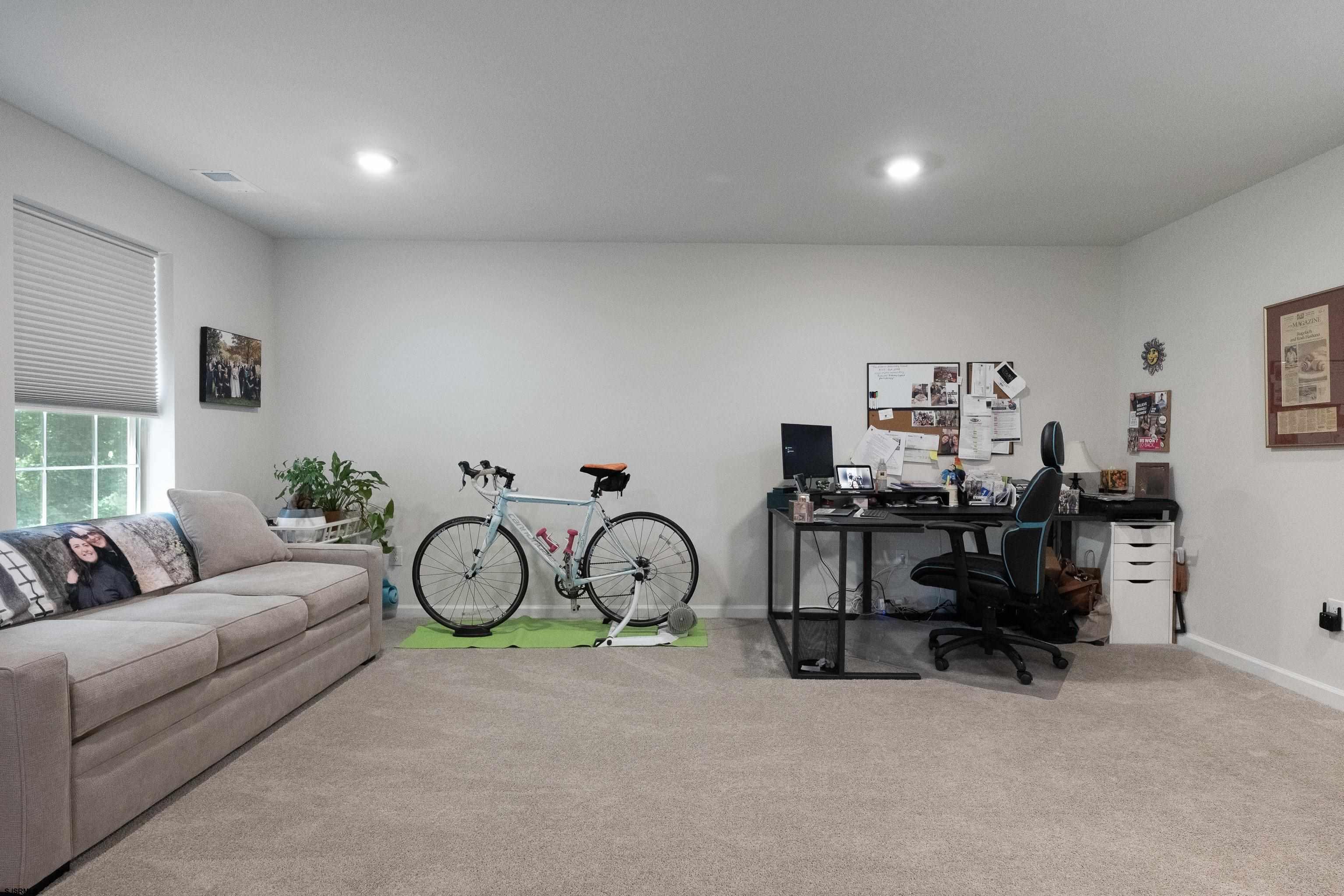18 Lilac Circle Mount Laurel, NJ 08054 - Photo 9 of 52 a living room with furniture a clock and a window
