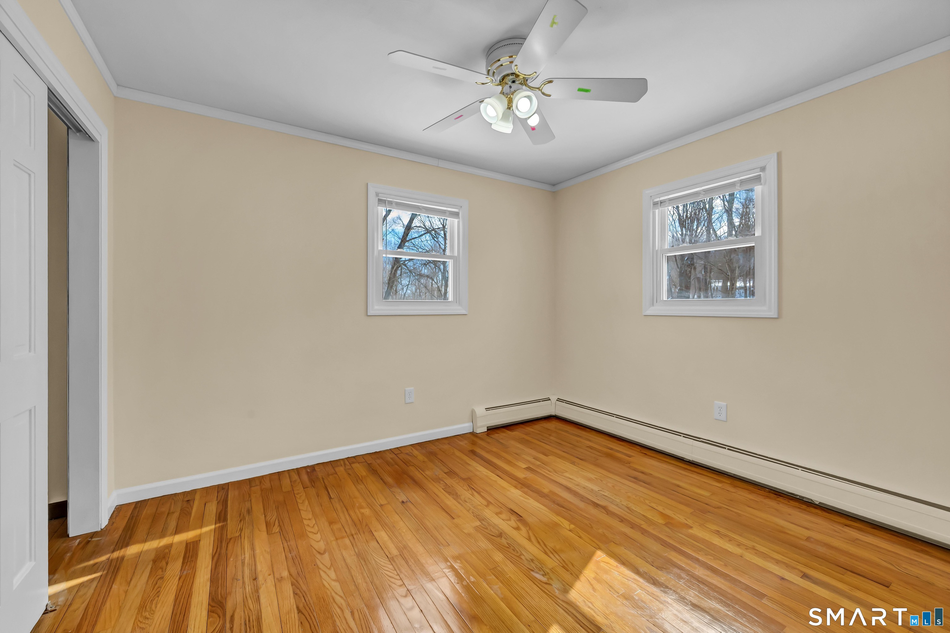 40 Middle River Road Danbury, CT 06811 - Photo 12 of 40 a view of empty room with wooden floor