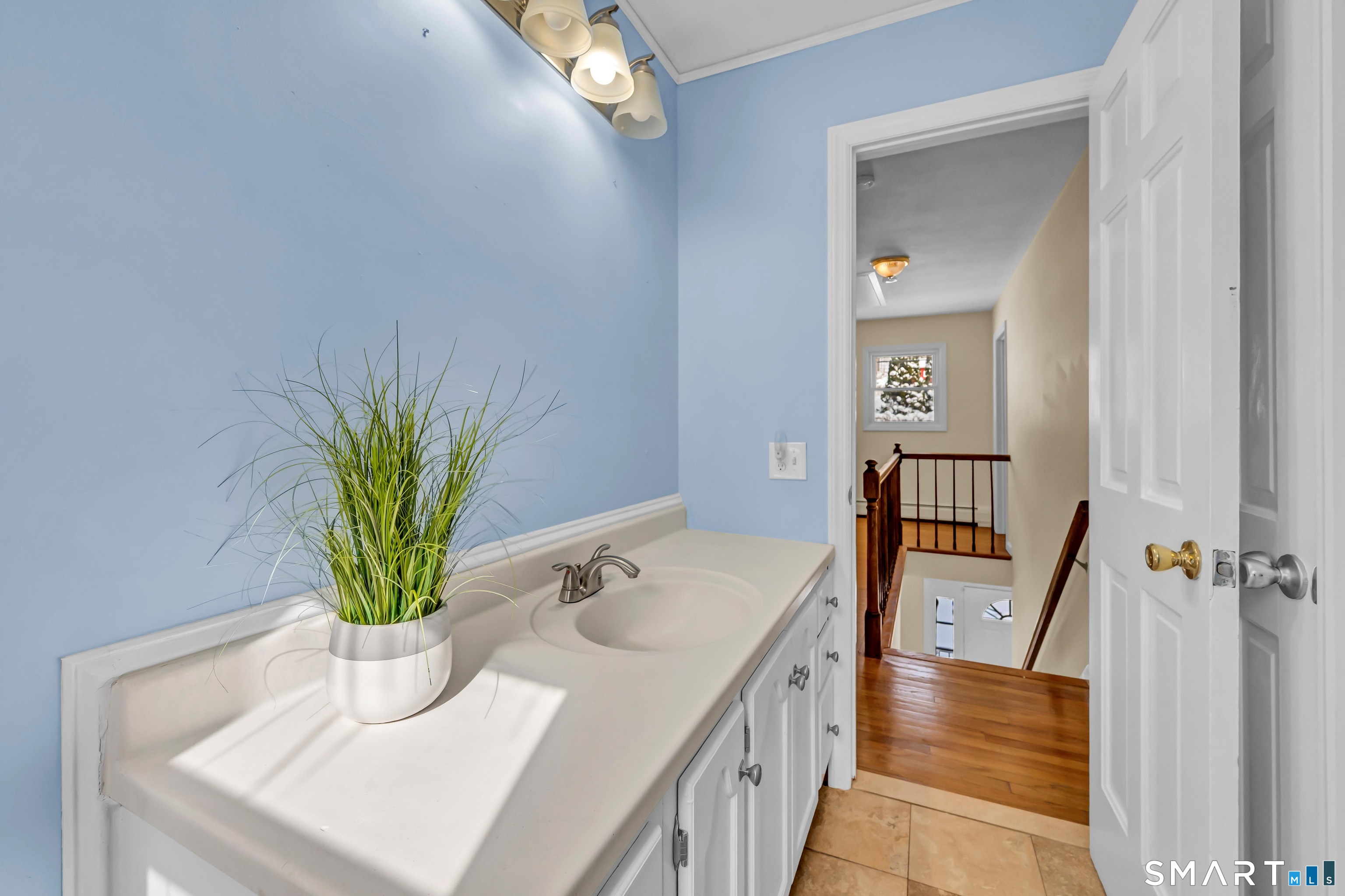 40 Middle River Road Danbury, CT 06811 - Photo 13 of 40 a bathroom with a sink a vanity and a mirror