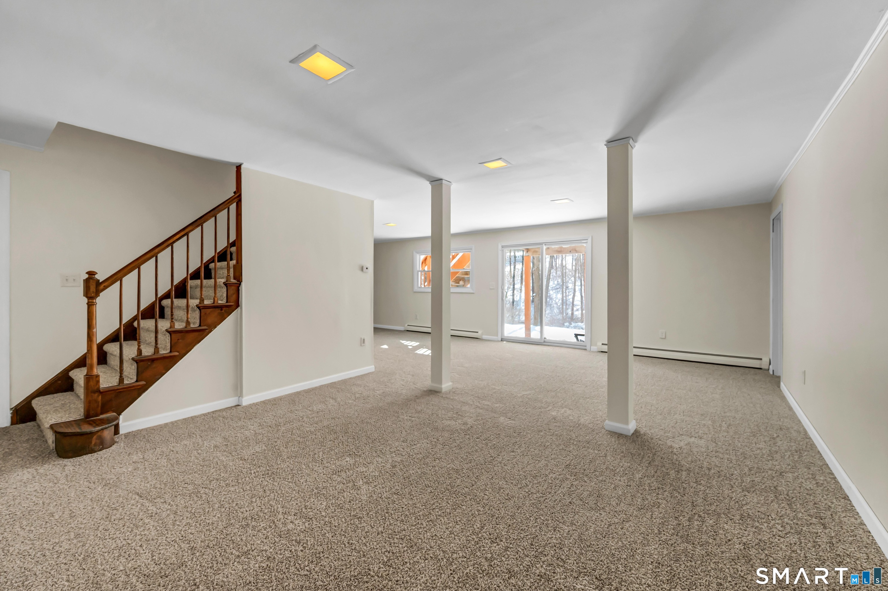 40 Middle River Road Danbury, CT 06811 - Photo 16 of 40 a view of an empty room with stairs